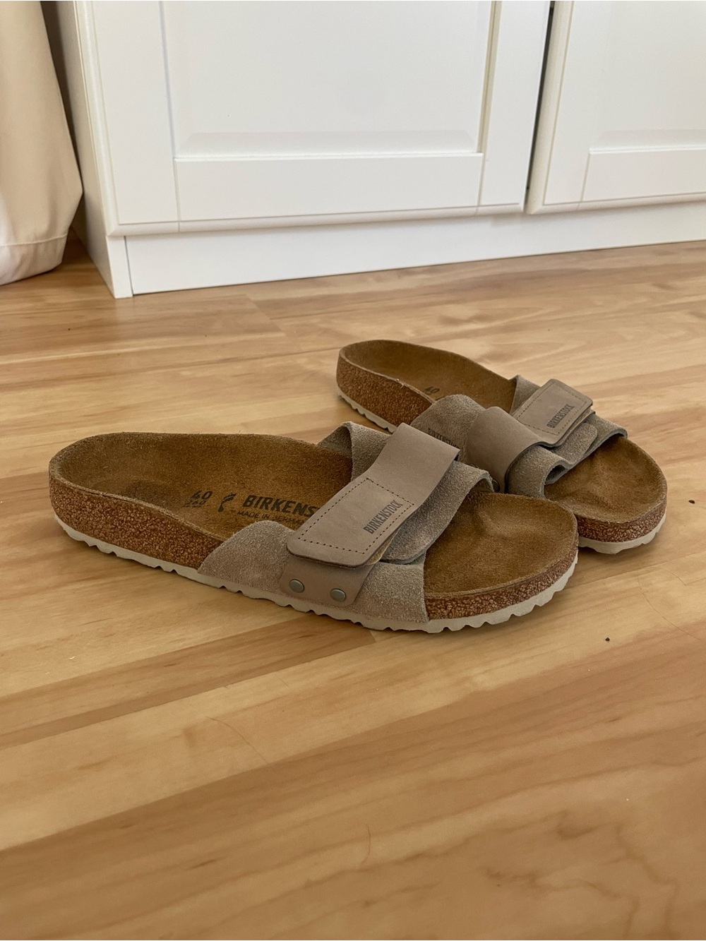 Birkenstock Oita suede leather. Single-Strap Slides in Light Taupe